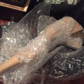 The UPS Store - Leg again. Note the cardboard triangles for support and edge protection - Shipping Centers Near Me - Chicago, Illinois