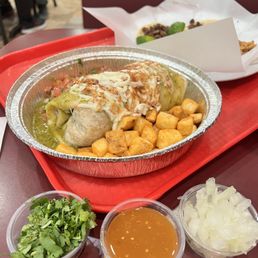 Green carne asada burrito with potatoes Green carne asada burrito with potatoes