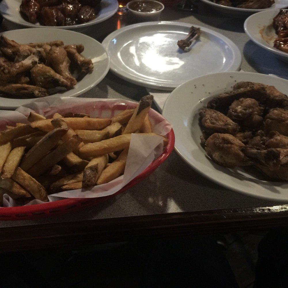 A nice assortment of their wings and awesome fries you should try for yourself. Make sure to come in on Wing Wednesday for a great deal! A nice assortment of their wings and awesome fries you should try for yourself. Make sure to come in on Wing Wednesday for a great deal!