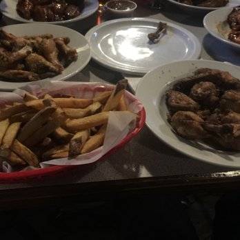 LB's Pub - A nice assortment of their wings and awesome fries you should try for yourself. Make sure to come in on Wing Wednesday for a great deal! - Pubs Near Me - St. Albert, Alberta