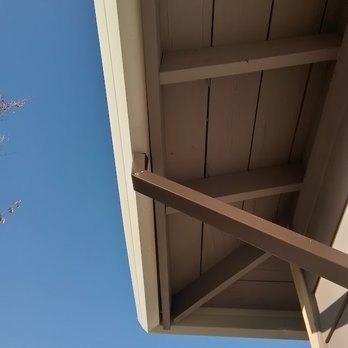 Complete Gutters - Brown down spout on white gutters - Gutter Services Near Me - Redding, California