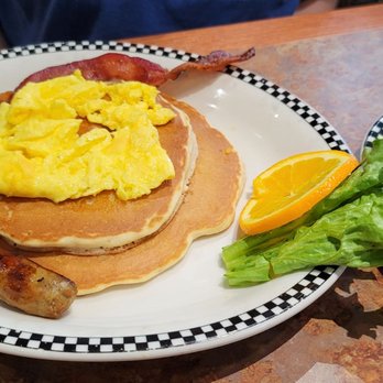 Black Bear Diner Moore - The mini Volcano. Pancakes, eggs, 1 sausage link, 2 strips of bacon, hashbrowns were extra. Seriously good pancakes though! - Diners Near Me - Moore, Oklahoma