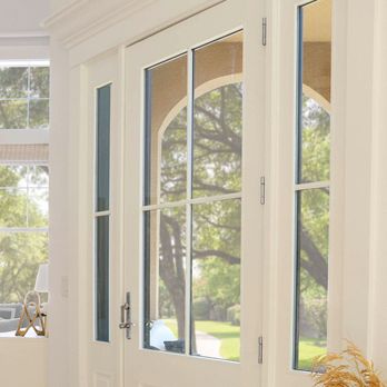Tru Blu High Performance Home - Replacement door in your future? This 1/2 Lite door with a 2x2 Grid, with matching sidlites are perfect for a Country Cottage home. - Windows Installation Near Me