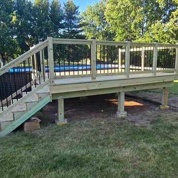 Infinity Fence & Deck Solutions - Another view, of the treated, yellow pine, wood, pool deck. Residential wooden, pool deck, that we built in Marengo. - Fences & Gates Near Me - Algonquin, Illinois Infinity Fence & Deck Solutions - Another view, of the treated, yellow pine, wood, pool deck. Residential wooden, pool deck, that we built in Marengo. - Fences & Gates Near Me - Algonquin, Illinois