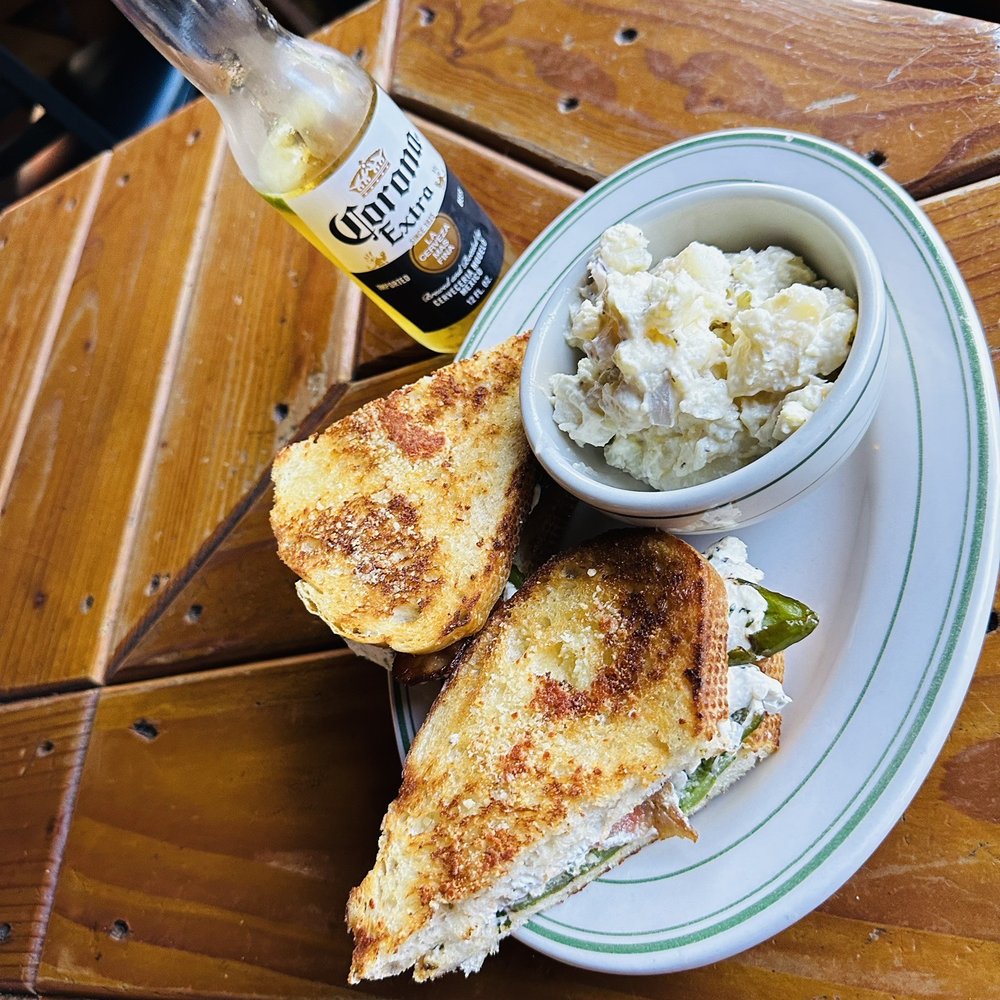 Trio Tavern - Super yummy Amazon crested bread with cream cheese, jalapeño cheddar cheese, and homemade potato salad - Bars Near Me - Mill City, Oregon Trio Tavern - Super yummy Amazon crested bread with cream cheese, jalapeño cheddar cheese, and homemade potato salad - Bars Near Me - Mill City, Oregon
