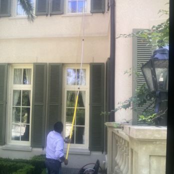 Masters Touch Services - Window washing using reverse osmosis system - Pressure Washers Near Me - Houston, Texas