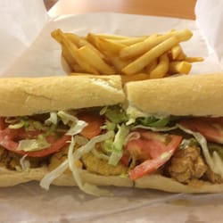 Mike's PO Boys - Oysters on the left, shrimp on the right all on a nice crusty french loaf.