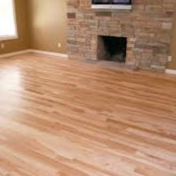 Omid Flooring & Remodeling - a living room with a fireplace - Flooring Near Me - Stafford, Virginia Omid Flooring & Remodeling - a living room with a fireplace - Flooring Near Me - Stafford, Virginia