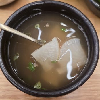 Han Sikdang - Emo noticed my son wasn't feeling well or eating much and brought him this warm Korean radish soup. Just the TLC we needed that night. - Korean Near Me - Aliso Viejo, California