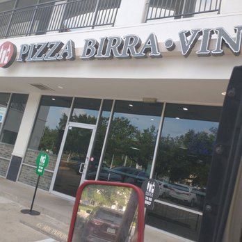 Pizza Birra Vino - a reflection of a woman in a mirror - Pizza Near Me - Houston, Texas Pizza Birra Vino - a reflection of a woman in a mirror - Pizza Near Me - Houston, Texas
