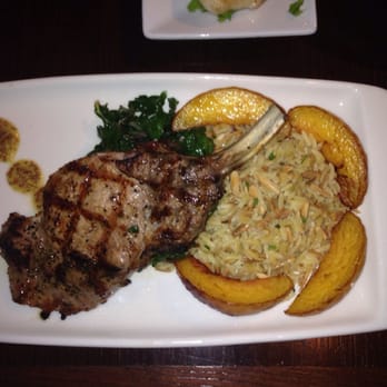 Glenn's Kitchen - Pork chop was marinated&grilled to perfection - New American Near Me - Atlanta, Georgia