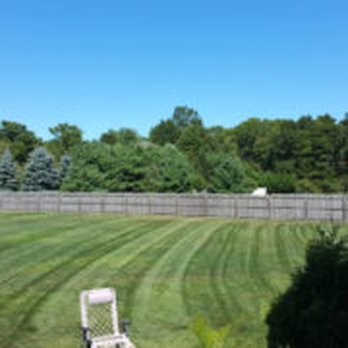 Green Horizon Enterprises - a lawn mower mowing the grass - Landscaping Near Me Green Horizon Enterprises - a lawn mower mowing the grass - Landscaping Near Me