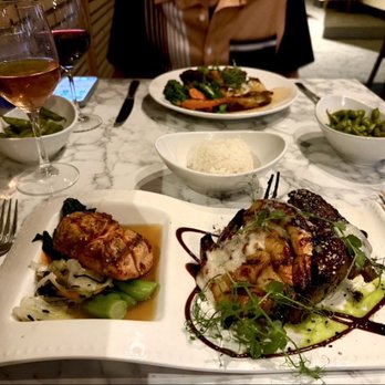 Roy's Ko Olina - Wife's duo dish of ribs, shrimp, and salmon - Asian Fusion Near Me - Kapolei, Hawaii