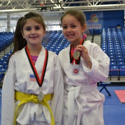 Blackhawk TaeKwonDo - Two Students showing off there 1st place Win