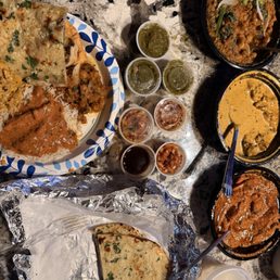 Garlic naan, buttered chicken, Samosa Chaat, Chana Masala, chicken masala, Garlic naan, buttered chicken, Samosa Chaat, Chana Masala, chicken masala,