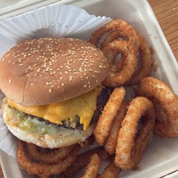 1/4 lb cheeseburger, onion rings 1/4 lb cheeseburger, onion rings