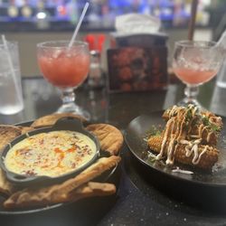 Mango's Lounge - Raspberry Margaritas Elote Ribz / queso with chorizo w/frybread