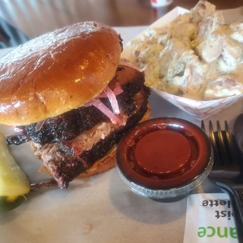 Bad to the Bone BBQ - Sliced brisket ("fatty"/from the point) sandwich With the pickled red onions of course with potato salad, while dining in - Barbeque Near Me - Henderson, Nevada Bad to the Bone BBQ - Sliced brisket ("fatty"/from the point) sandwich With the pickled red onions of course with potato salad, while dining in - Barbeque Near Me - Henderson, Nevada