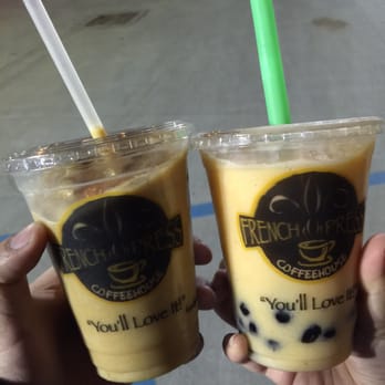 French Press Coffee House - Left - Creme Brûlée Freeze right- Passion Fruit Bubble Tea (Boba Tea) - Coffee & Tea Near Me - Metairie, Louisiana