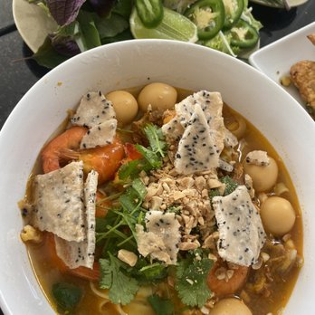Pho Minh - Mi Quang (my fav!). Tumeric fat, yellow rice noodles in pork broth with shrimp & quail eggs - Vietnamese Near Me - San Diego, California Pho Minh - Mi Quang (my fav!). Tumeric fat, yellow rice noodles in pork broth with shrimp & quail eggs - Vietnamese Near Me - San Diego, California