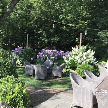 Golden Pheasant Inn - The Golden Pheasant garden by the canal - New American Near Me - Erwinna, Pennsylvania