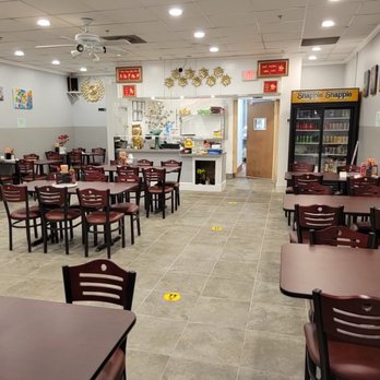 Pho Golden Cow 2 - Dining room. Peacock wall clock at upper left corner. - Vietnamese Near Me - Springfield, Virginia Pho Golden Cow 2 - Dining room. Peacock wall clock at upper left corner. - Vietnamese Near Me - Springfield, Virginia