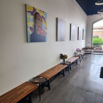 Yo Mochi - a row of benches in a cafe - Donuts Near Me - Henderson, Nevada