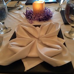 Magnolia shape napkin fold Magnolia shape napkin fold