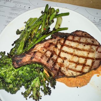 Sixty Vines - Pork chop with broccoli - New American Near Me - Dallas, Texas
