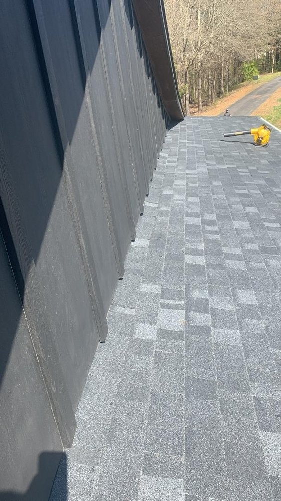 Slide of E. Thompson Roofing