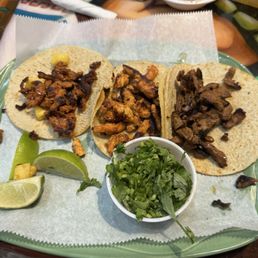 Three tacos ( grilled chicken, al pastor and carne asada