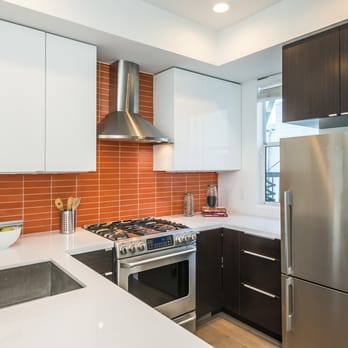 Nathan Cole Construction - a modern kitchen with stainless steel appliances - General Contractors Near Me - San Francisco, California Nathan Cole Construction - a modern kitchen with stainless steel appliances - General Contractors Near Me - San Francisco, California