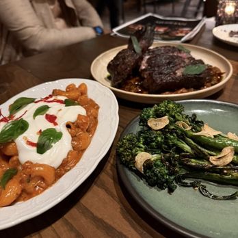 Meridian - LAMB BOLOGNESE DRY AGED RIBEYE 26 oz CHARRED BROCCOLINI - New American Near Me - Dallas, Texas