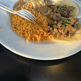 Taqueria La Flama - Kids asada tacos with rice and beans. Solid rice and beans, we can't wait for the kids to say they're full to eat it haha. - Mexican Near Me - Boise, Idaho