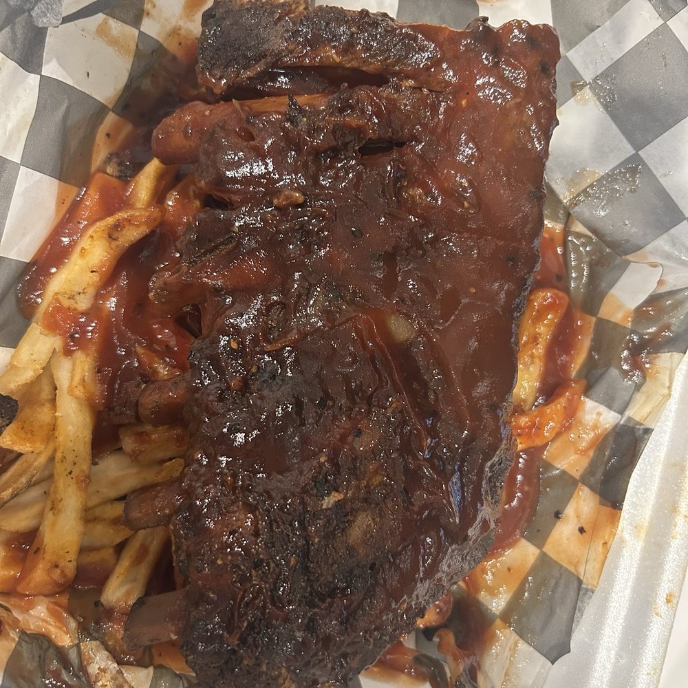 Big Daddy's BBQ - This is suppose to be a full slab of baby back ribs - Barbeque Near Me - Gary, Indiana