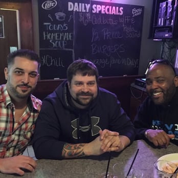 Casey's Pub - three men sitting at a bar - Sports Bars Near Me - Loves Park, Illinois