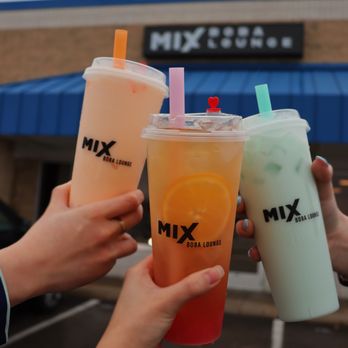 Mix Boba Lounge - Boba with buddies! 

Left: Banana + Pineapple Smoothie
Center: Rose + Longan Fresh Tea
Right: Cotton Candy + Lychee Milk Tea - Bubble Tea Near Me - Grand Rapids, Michigan