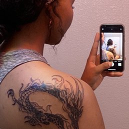 I'm so happy I get to live with this dragon tattoo for the rest of my life. I'm so happy I get to live with this dragon tattoo for the rest of my life.