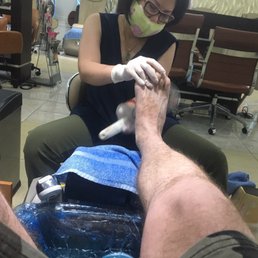 Exfoliating my dragon feet. Exfoliating my dragon feet.