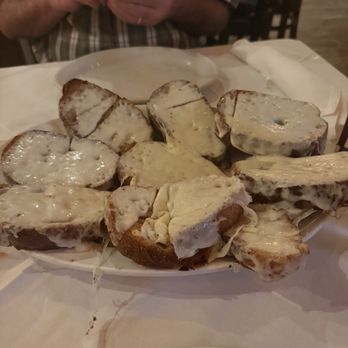 Carmine's - Time Square - One order of cheese garlic bread and one order of parm chicken plus pasta. - Italian Near Me - New York, New York Carmine's - Time Square - One order of cheese garlic bread and one order of parm chicken plus pasta. - Italian Near Me - New York, New York