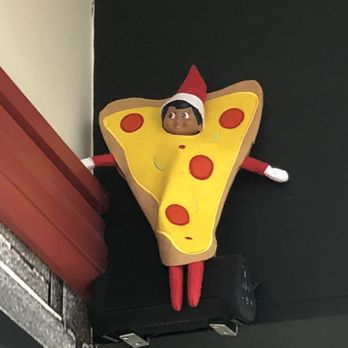 Tower Pizza - a elf on a shelf with a slice of pizza - Pizza Near Me - Staples, Minnesota