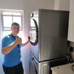 Appliance Repairman Bay Area - dismantling old household appliances moving to the garage and installing new dryers and washing machines
