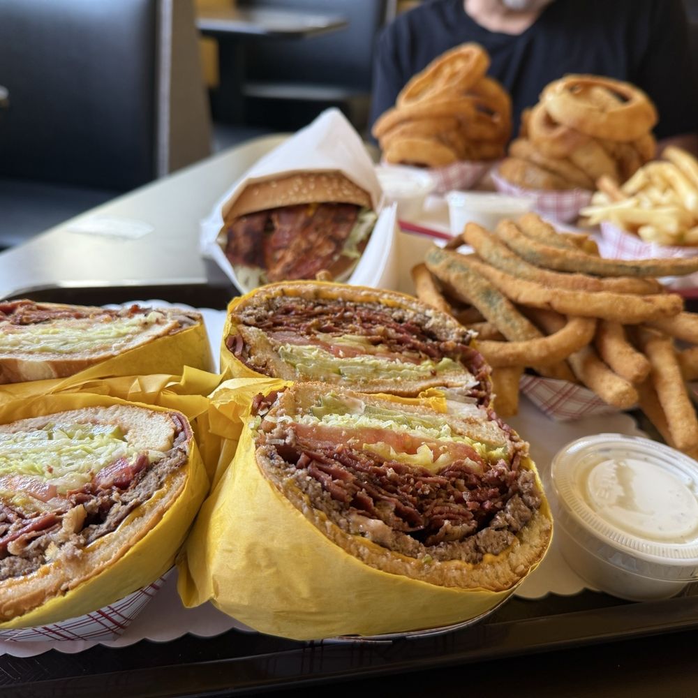 Pastrami Cheese Burgers, Bacon Cheeseburger, Onion Rings, Fried Zucchini, Fries. Pastrami Cheese Burgers, Bacon Cheeseburger, Onion Rings, Fried Zucchini, Fries.