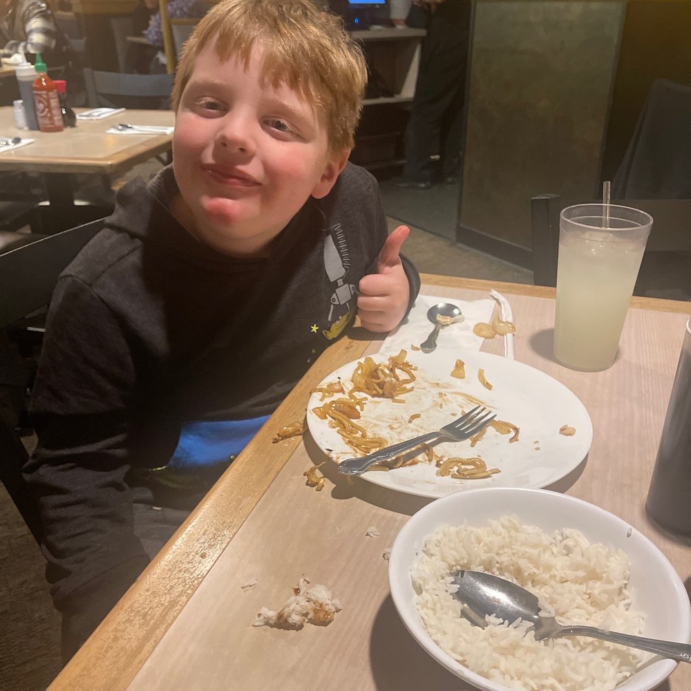 Little dude enjoying his noodles. :)