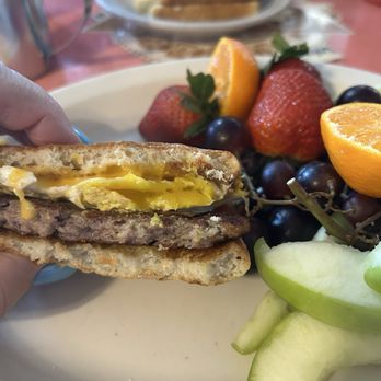 Marcia's Silver Spoon Cafe - Breakfast Sammy and perfect egg inside. With fruit! Yum - Breakfast & Brunch Near Me - Tacoma, Washington Marcia's Silver Spoon Cafe - Breakfast Sammy and perfect egg inside. With fruit! Yum - Breakfast & Brunch Near Me - Tacoma, Washington