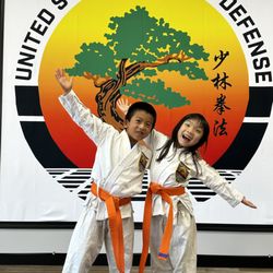 Just earned a stripe! Photo by our logo wall