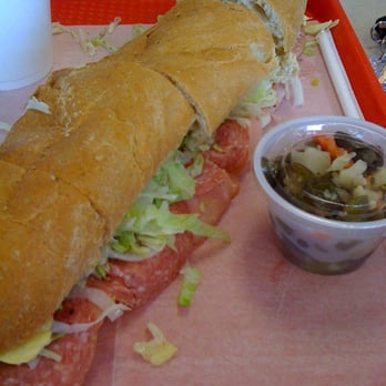 Jersey Giant Submarine - a sandwich with a side of pickles - Sandwiches Near Me - Woodhaven, Michigan Jersey Giant Submarine - a sandwich with a side of pickles - Sandwiches Near Me - Woodhaven, Michigan