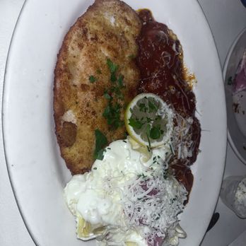 Bella Italia - a plate of food with meat, cheese, and sauce - Italian Near Me - Kennewick, Washington