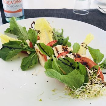 Negroamaro - Tomatoes were not organic. Moz was not fresh made. The 3 bites of the greens were delicious so there's that - Italian Near Me - Tulum, ROO