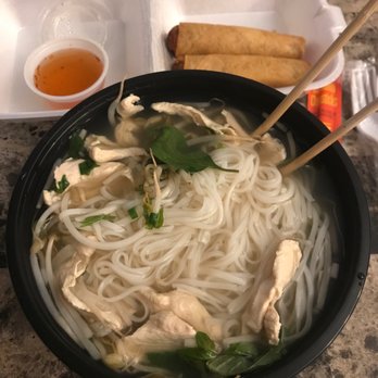 Mia’s Wok - a bowl of chicken noodle with chopsticks - Asian Fusion Near Me - Billings, Montana